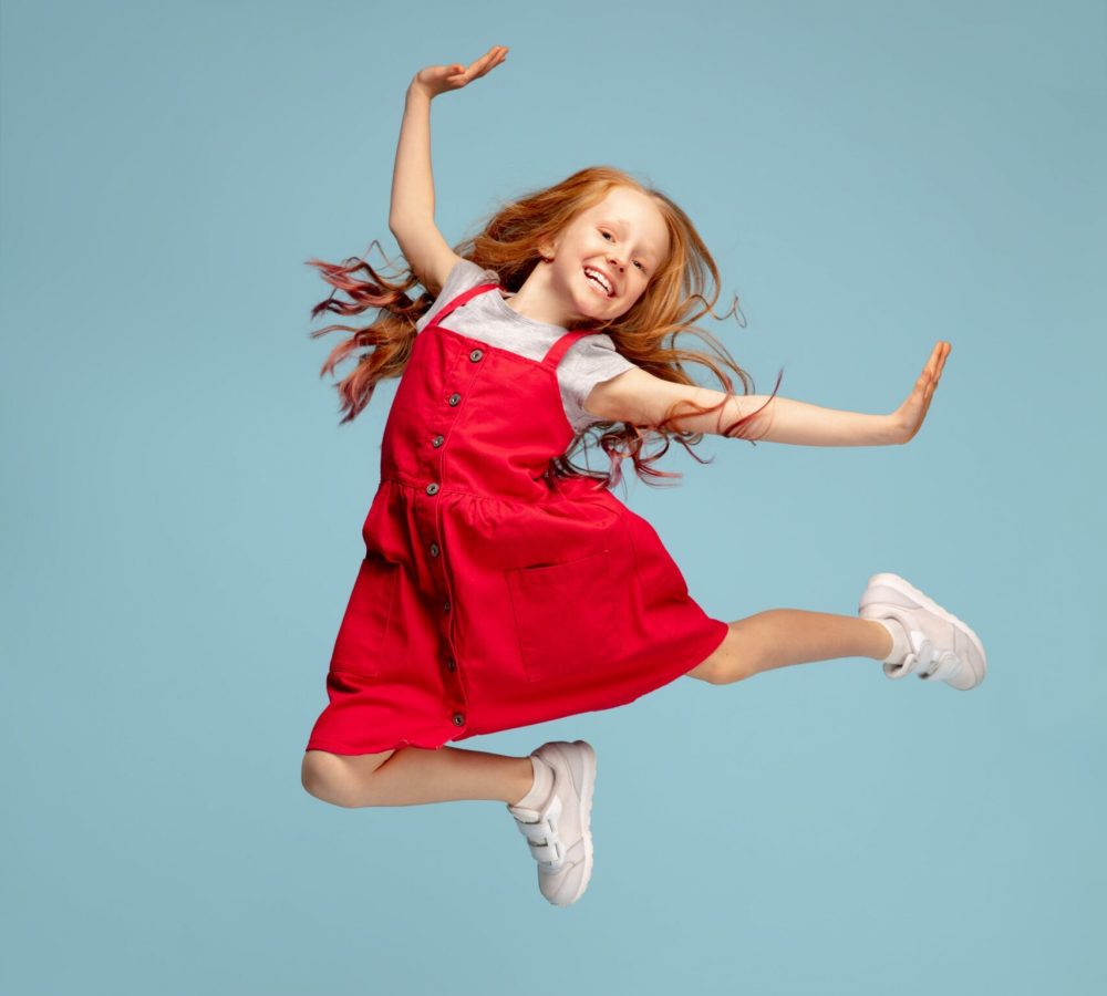happy-children-isolated-blue-studio-background-looks-happy-cheerful-sincere-copyspace-childhood-education-emotions-concept-min